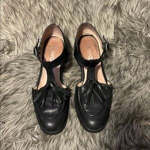 Black T-Strap Loafers with Tassel Detail